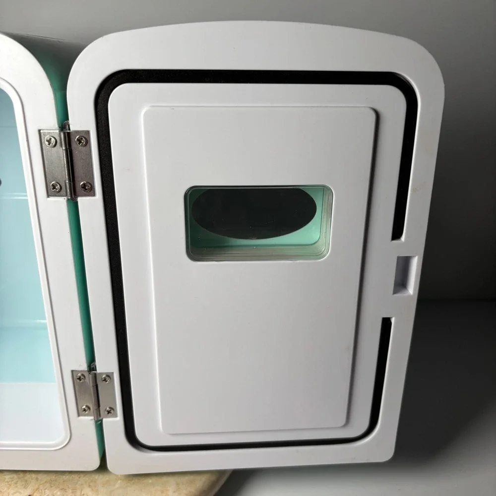 Nostalgia Retro 6-Can Personal Cooling and Heating Refrigerator Blue Mini Fridge